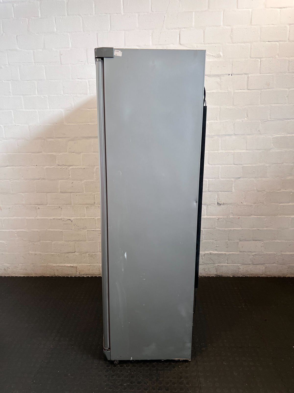 Sleek Silver Double Door Fridge Freezer - Faulty Freezer. Some rusting on the bottom