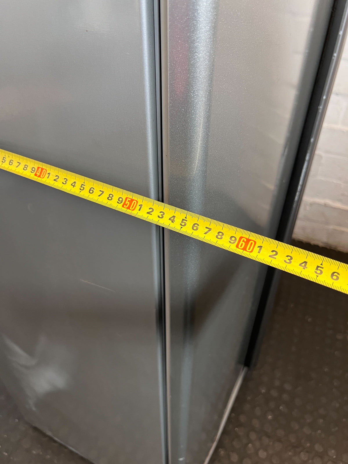 Sleek Silver Double Door Fridge Freezer - Faulty Freezer. Some rusting on the bottom