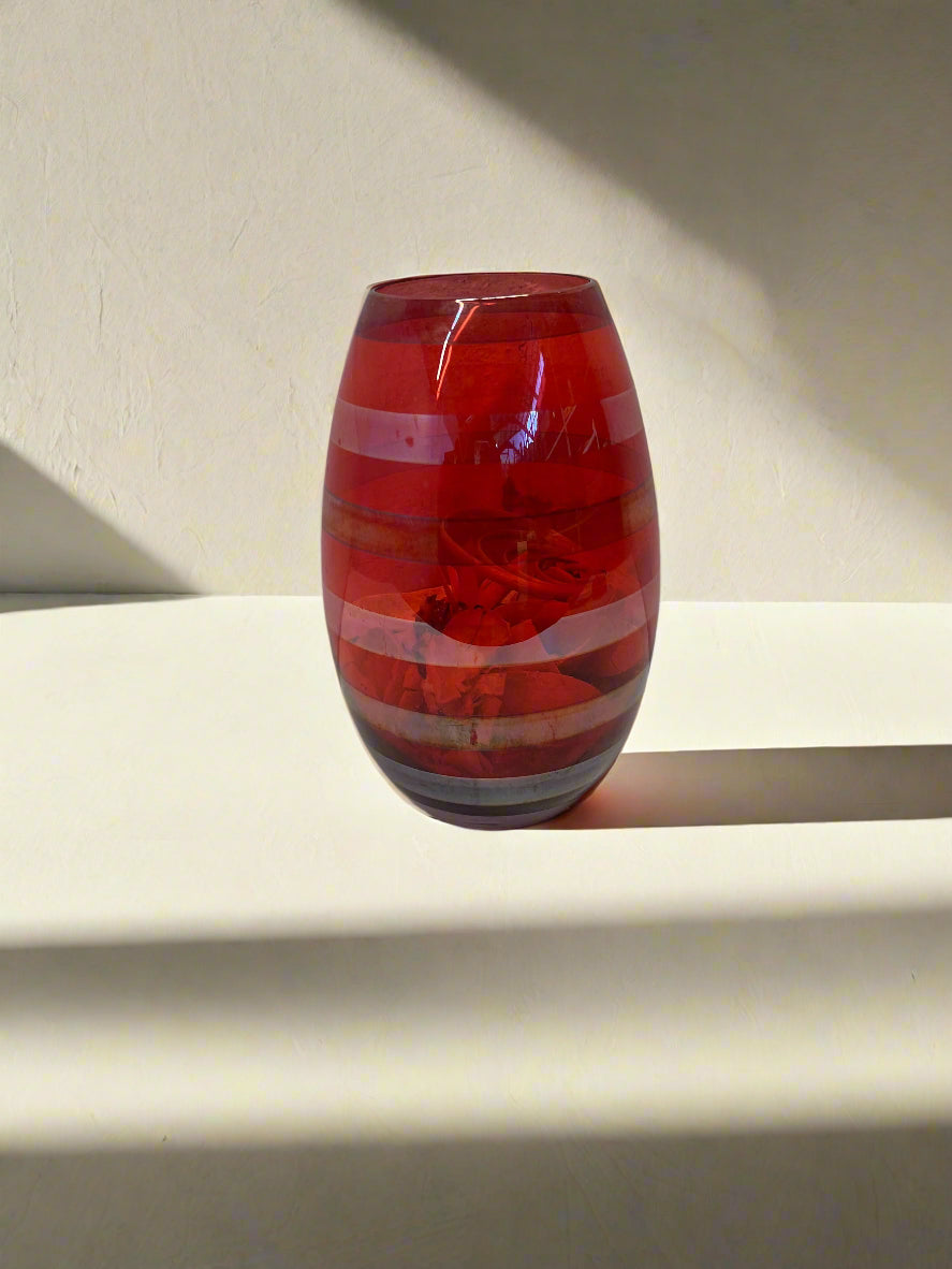 Vibrant Red Glass Vase with Striped Design