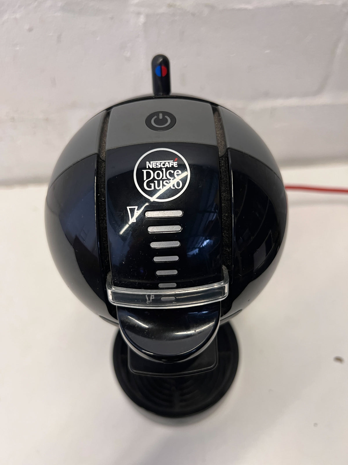 De'Longhi Nescafé Dolce Gusto Coffee Machine - Sleek Black Design