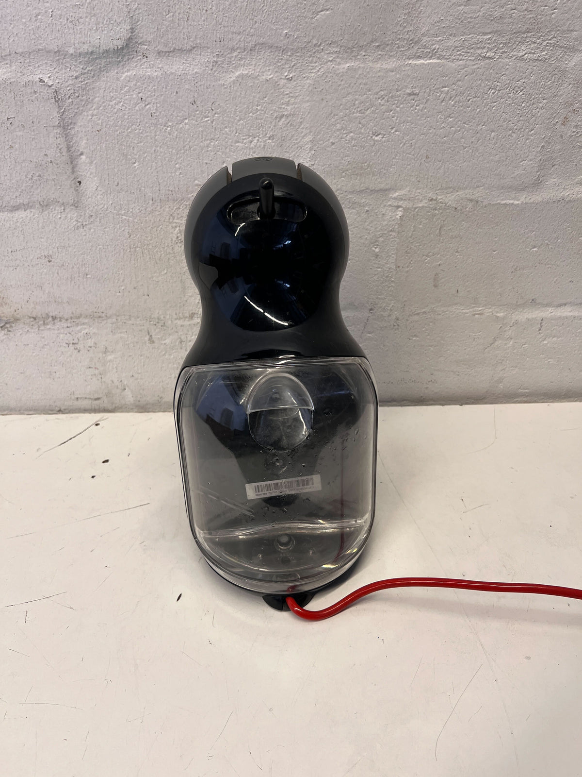 De'Longhi Nescafé Dolce Gusto Coffee Machine - Sleek Black Design