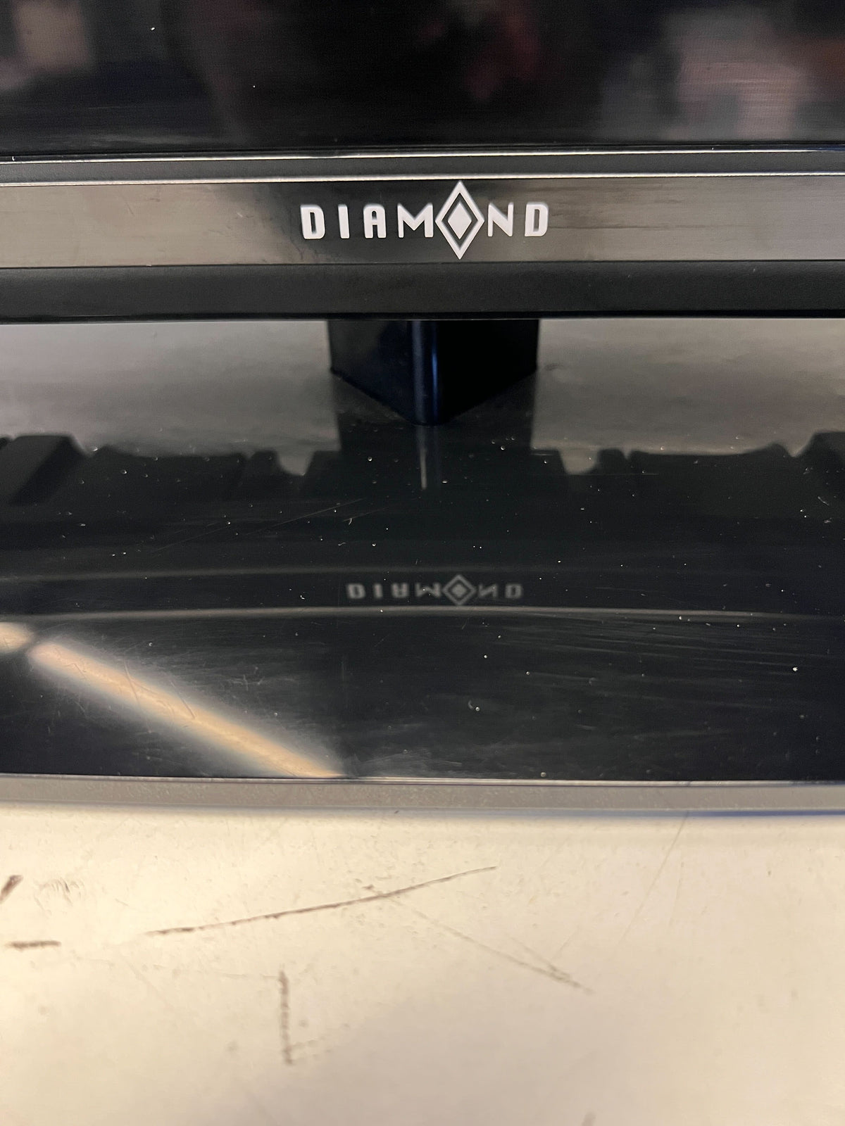 32-inch LED TV - Slim Black Design with Minor Scratches