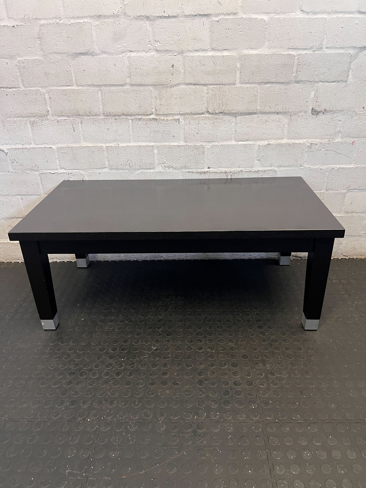 Sleek Black Rectangular Coffee/Utility Table with Modern Accents