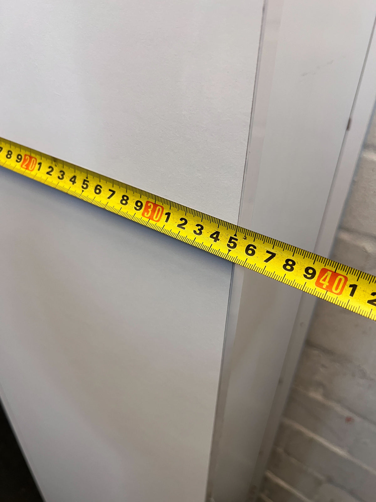 Sleek White Tall Storage Cabinet