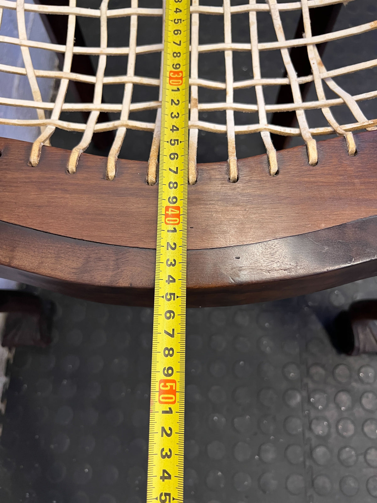 Elegant Vintage Dark Wood Armchair with Woven Seat