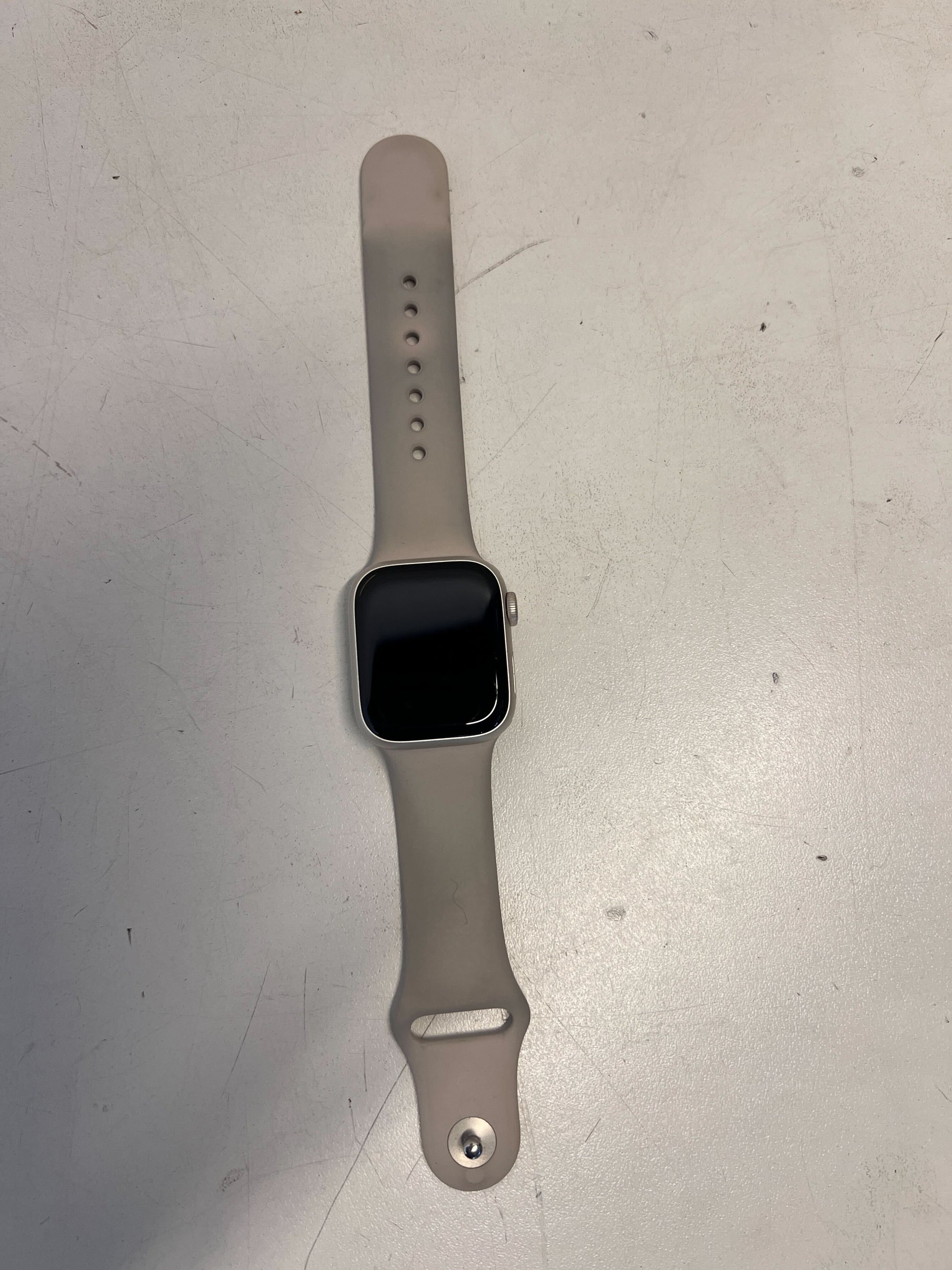 Stylish Silver Apple Watch with Soft Grey Band - Minor Scratches