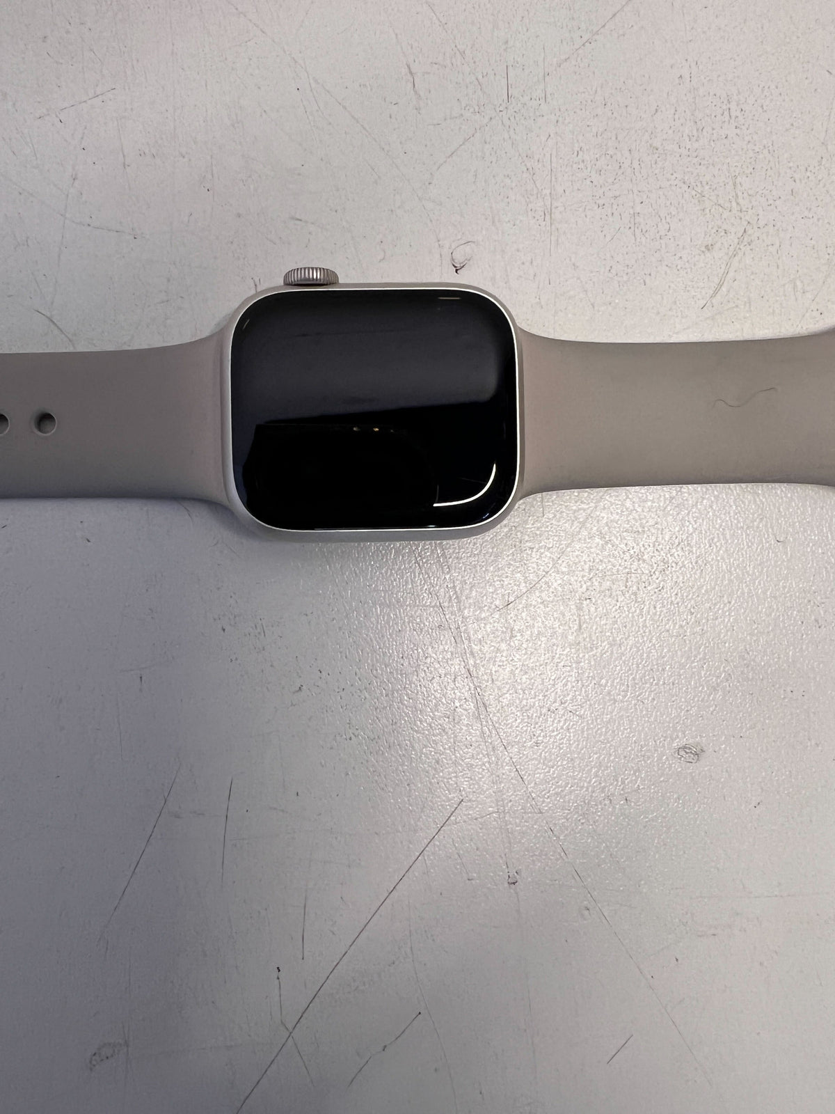 Stylish Silver Apple Watch with Soft Grey Band - Minor Scratches