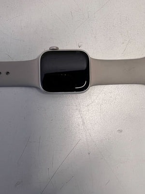 Stylish Silver Apple Watch with Soft Grey Band - Minor Scratches
