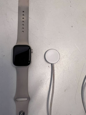 Stylish Silver Apple Watch with Soft Grey Band - Minor Scratches
