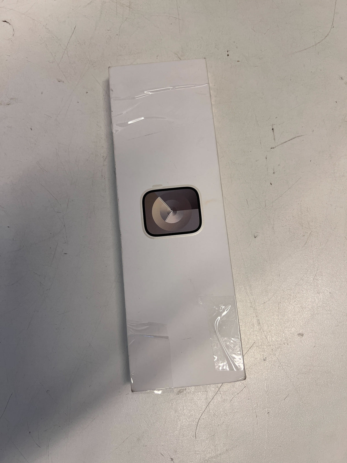 Stylish Silver Apple Watch with Soft Grey Band - Minor Scratches