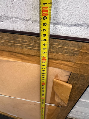 striking framed portrait with maroon matting and dark wood frame