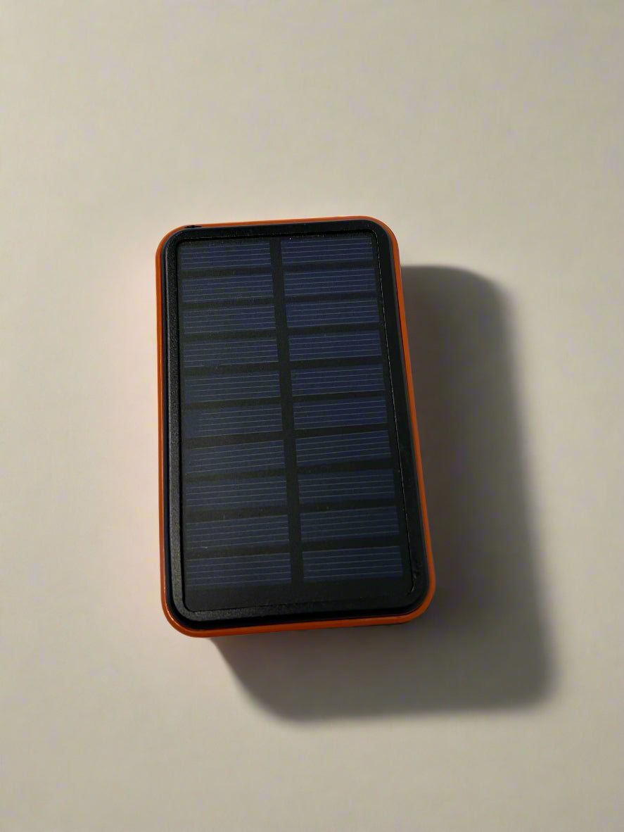 Solar power bank with orange border on a light gray background