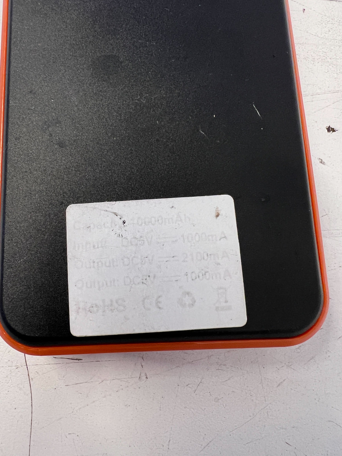 Compact Solar Power Bank with Durable Orange Edge – Excellent Condition