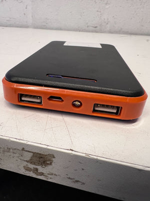 Compact Solar Power Bank with Durable Orange Edge – Excellent Condition