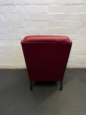 Elegant Vintage Burgundy Leather Wingback Chair with Minor Wear