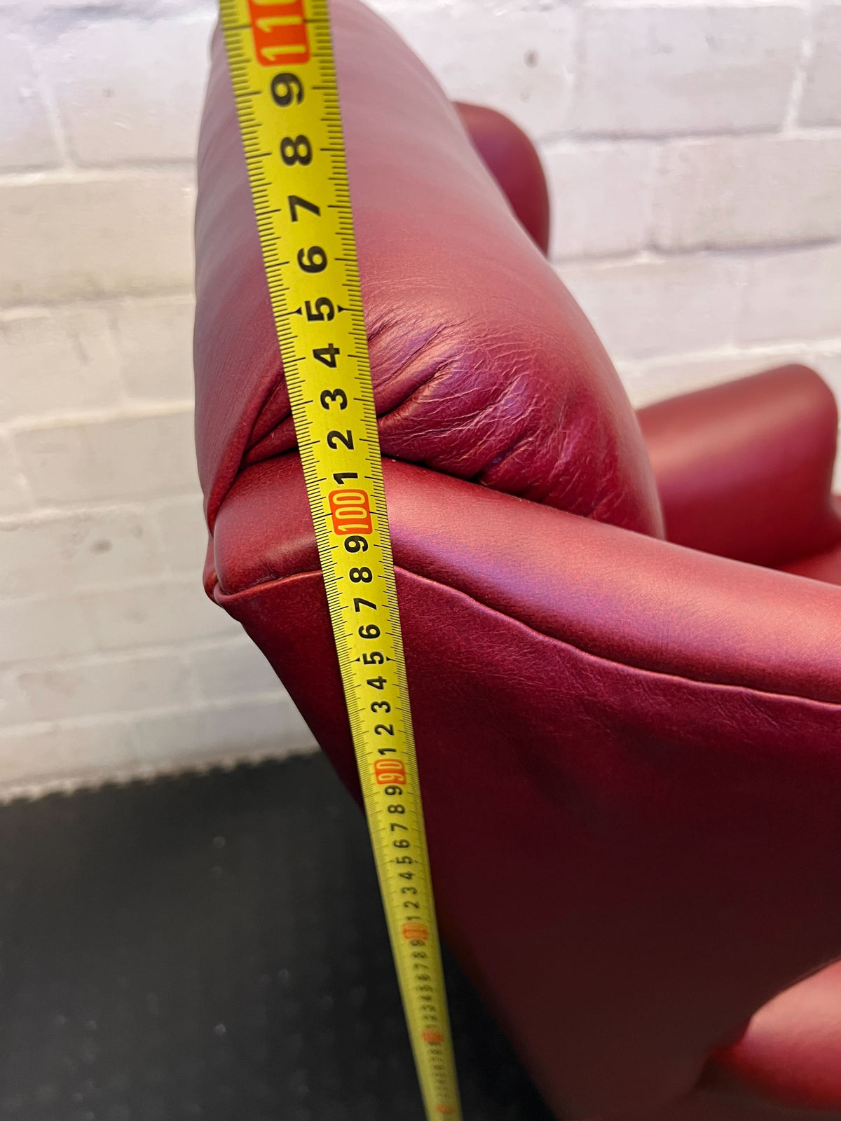 Elegant Vintage Burgundy Leather Wingback Chair with Minor Wear