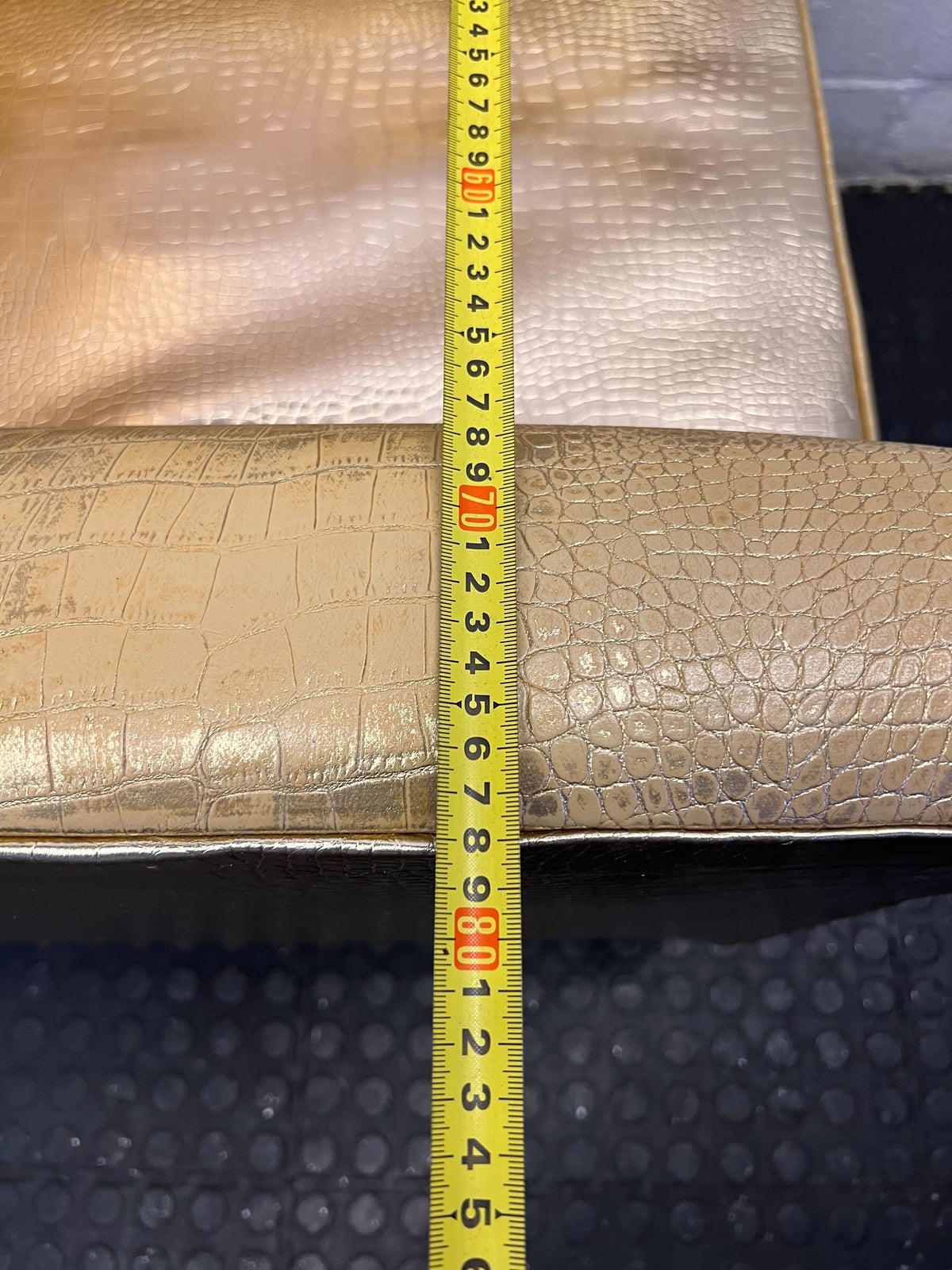 Glamorous Gold Faux Leather High-Back Armchair with Minor Wear