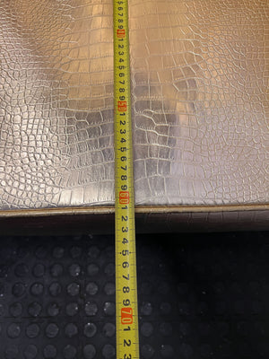 Glamorous Gold Faux Leather High-Back Armchair with Minor Wear