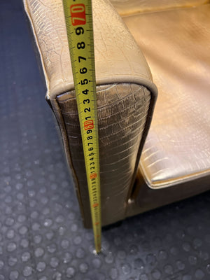 Glamorous Gold Faux Leather High-Back Armchair with Minor Wear