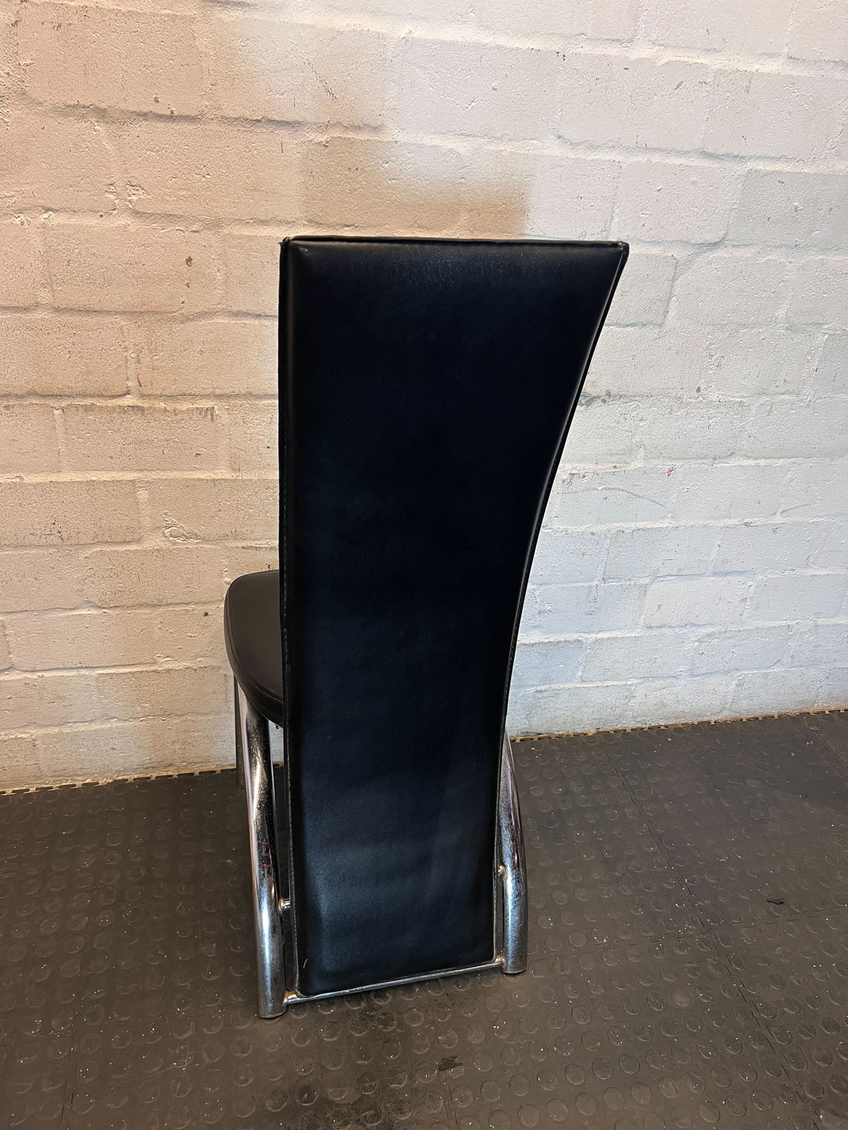 Sleek Black Faux Leather Dining Chair - 2ndhandwarehouse.com