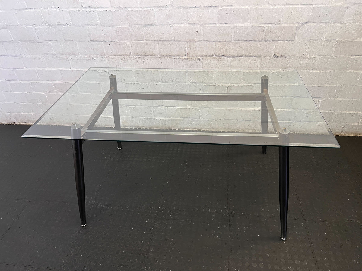 Sleek Glass & Metal Dining Table with Tapered Legs- Fair used