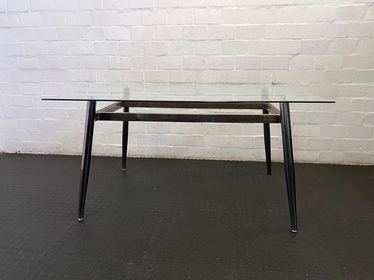 Sleek Glass & Metal Dining Table with Tapered Legs- Fair used