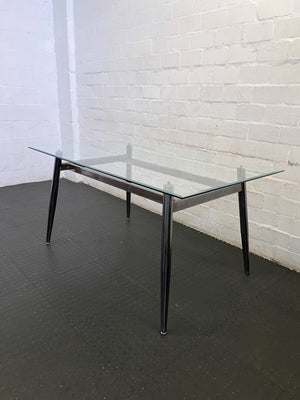 Sleek Glass & Metal Dining Table with Tapered Legs- Fair used