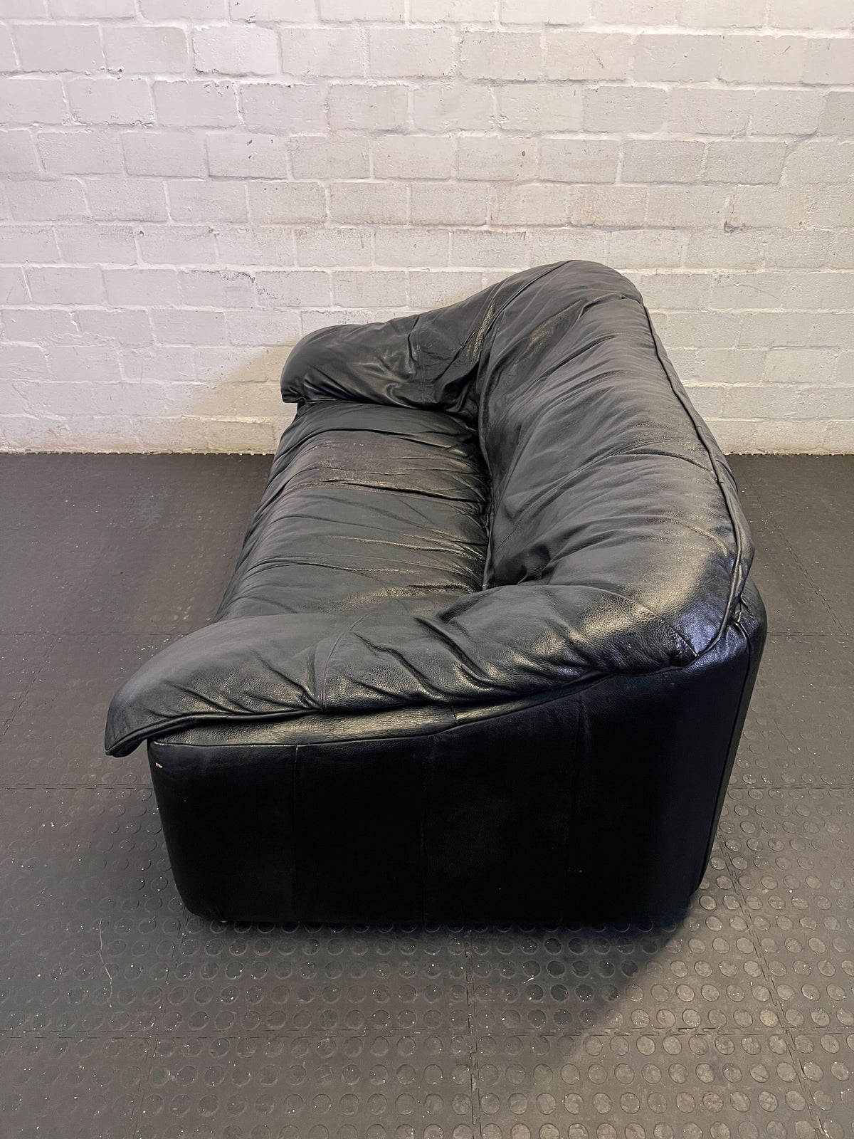 Classic Black Leather Sofa - Cozy 2-Seater- Fair used