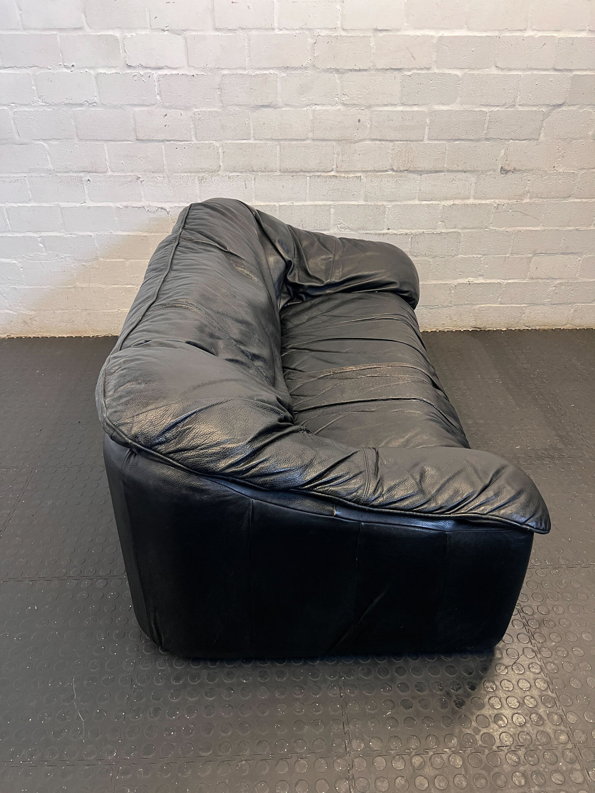 Classic Black Leather Sofa - Cozy 2-Seater- Fair used