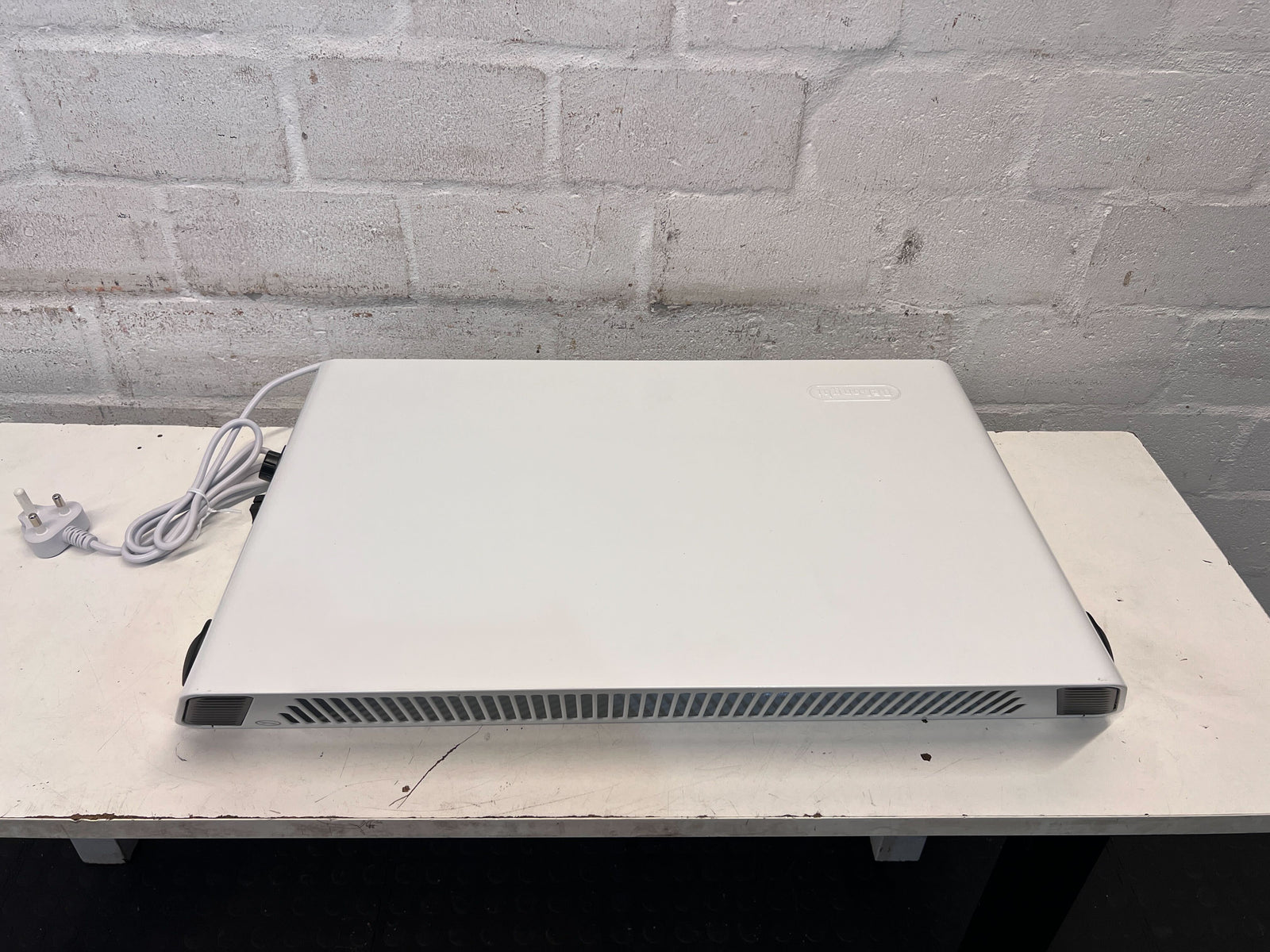 Delonghi White Compact Heater – Slight Wear, Efficient Heating - PRICE DROP