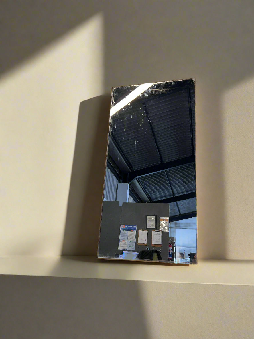 Sleek Rectangular Wall Mirror with Minor Scratches