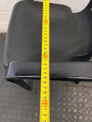 Durable Black Plastic Chair with Minor Scratches