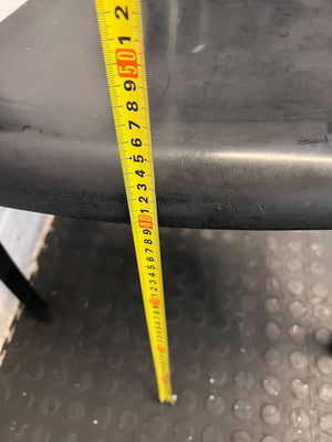 Durable Black Plastic Chair with Minor Scratches