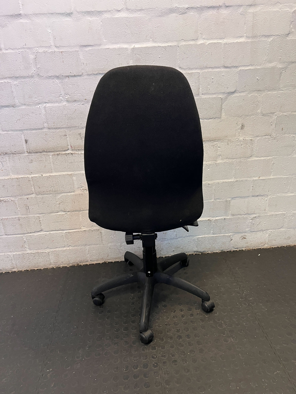 Comfortable Black Fabric Office Chair with Minor Wear