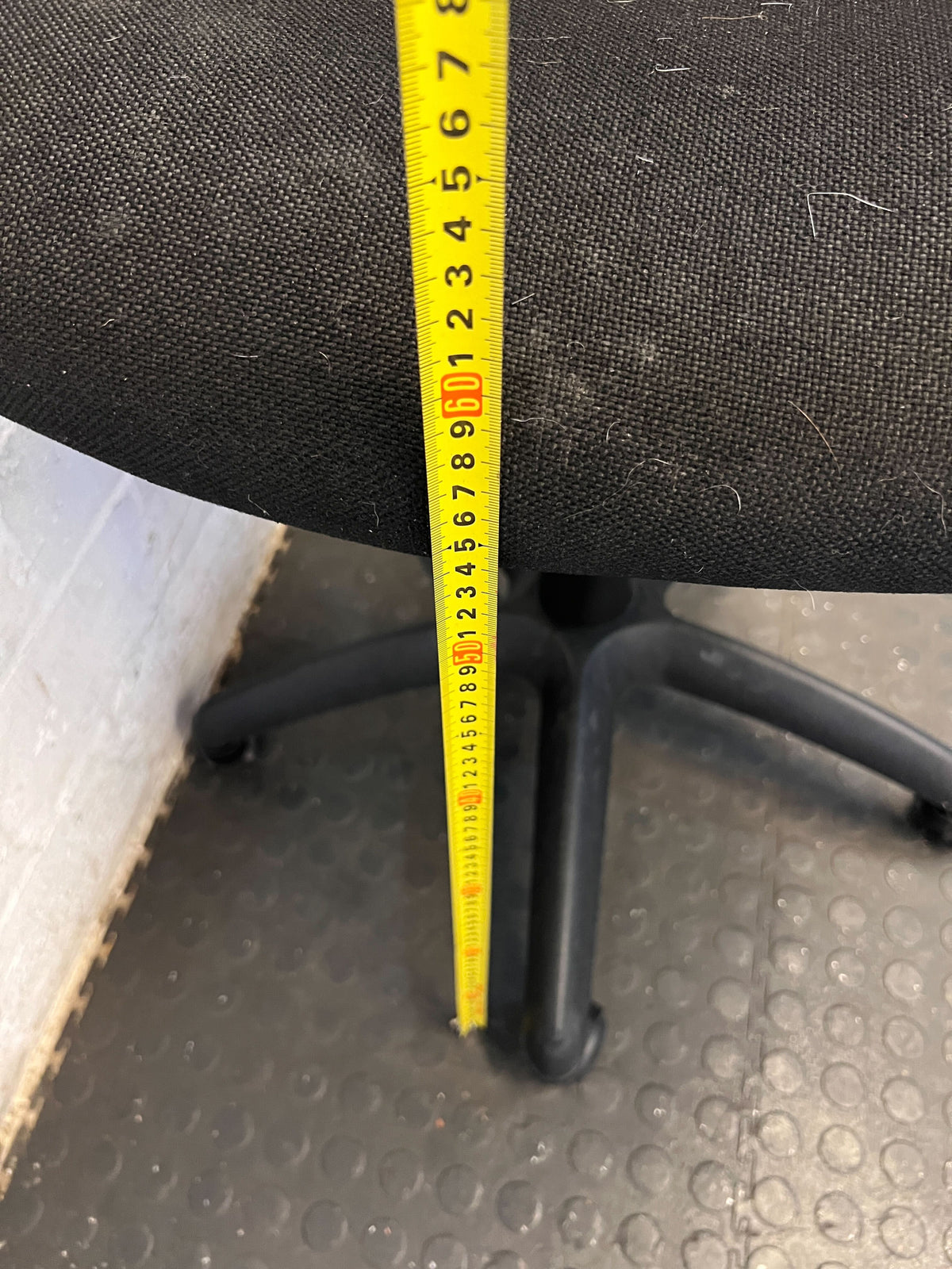 Comfortable Black Fabric Office Chair with Minor Wear