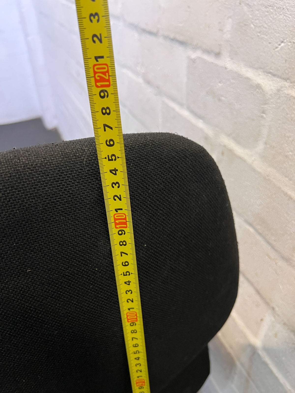 Comfortable Black Fabric Office Chair with Minor Wear