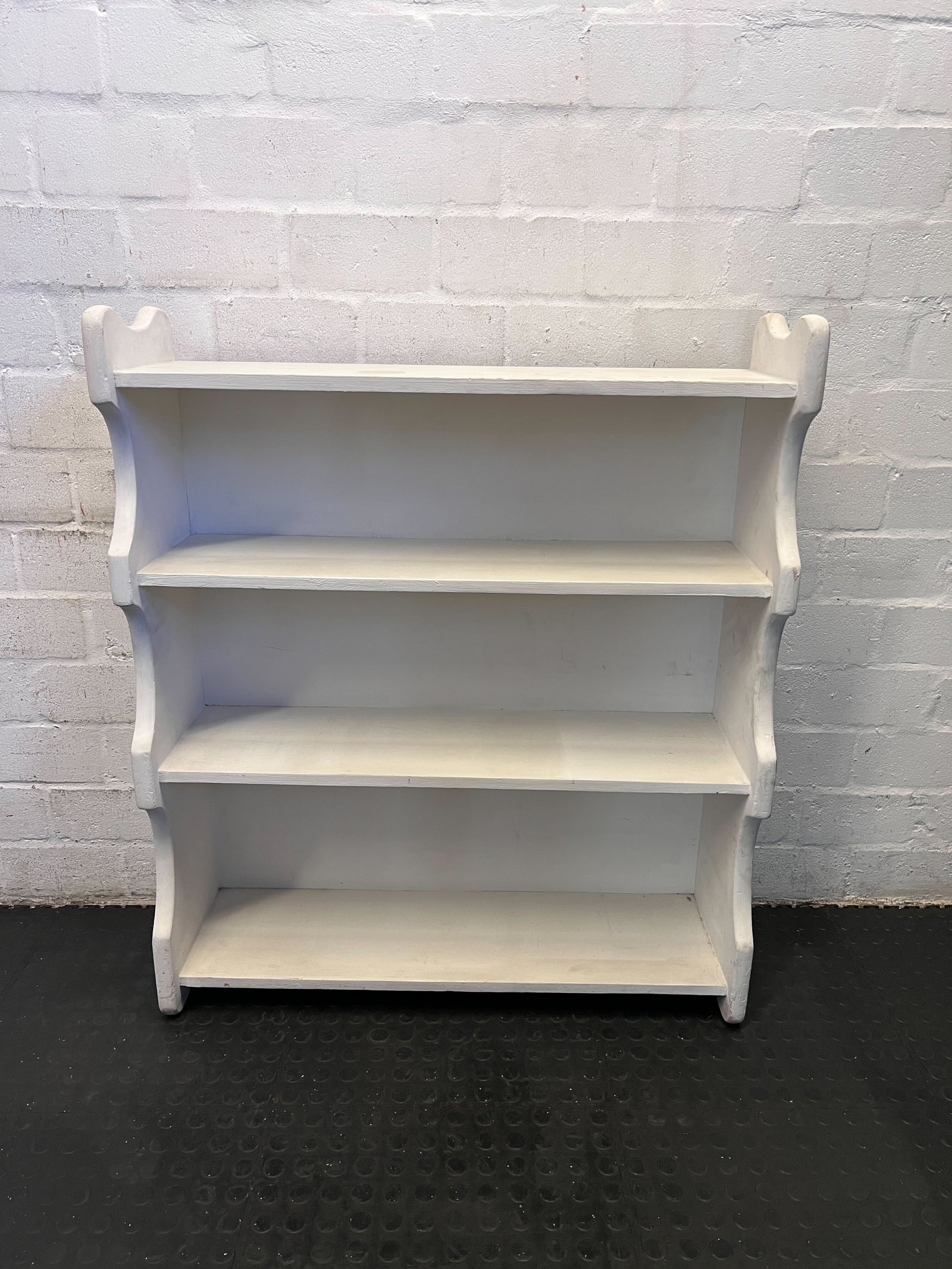 Chic White Wooden Three-Shelf Bookcase with Decorative Curves