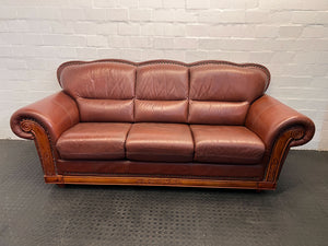 Classic Brown Leather Sofa with Wooden Accents