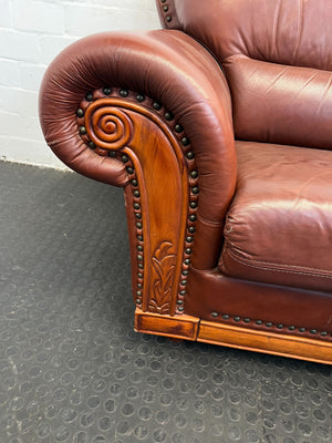 Classic Brown Leather Sofa with Wooden Accents