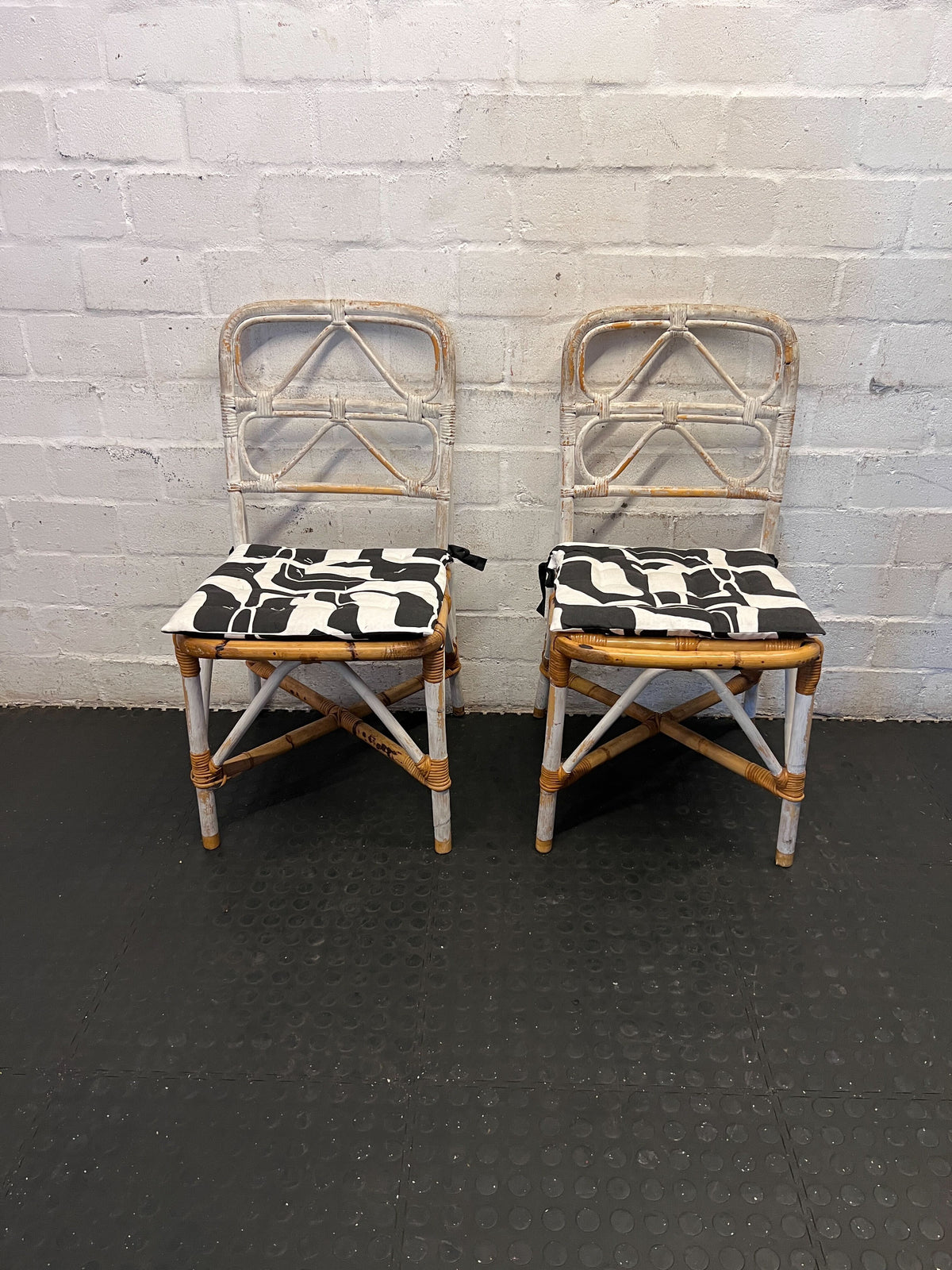 Distressed White Rattan Chair with Modern Graphic Cushion - 2ndhandwarehouse.com