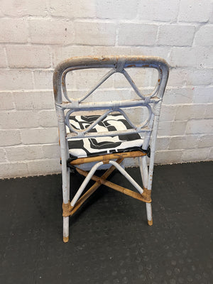 Distressed White Rattan Chair with Modern Graphic Cushion - 2ndhandwarehouse.com