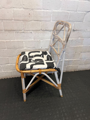 Distressed White Rattan Chair with Modern Graphic Cushion - 2ndhandwarehouse.com