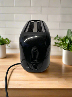 Stylish Black Two-Slice Toaster with Minor Scratches