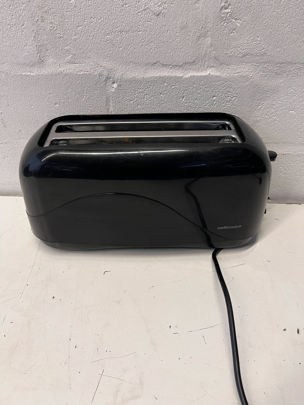 Stylish Black Two-Slice Toaster with Minor Scratches