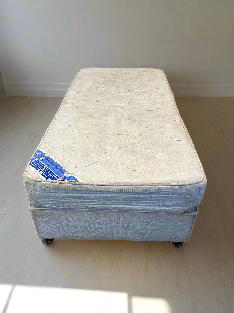 Comfortable Single Bed with Minor Wear - Great Value!
