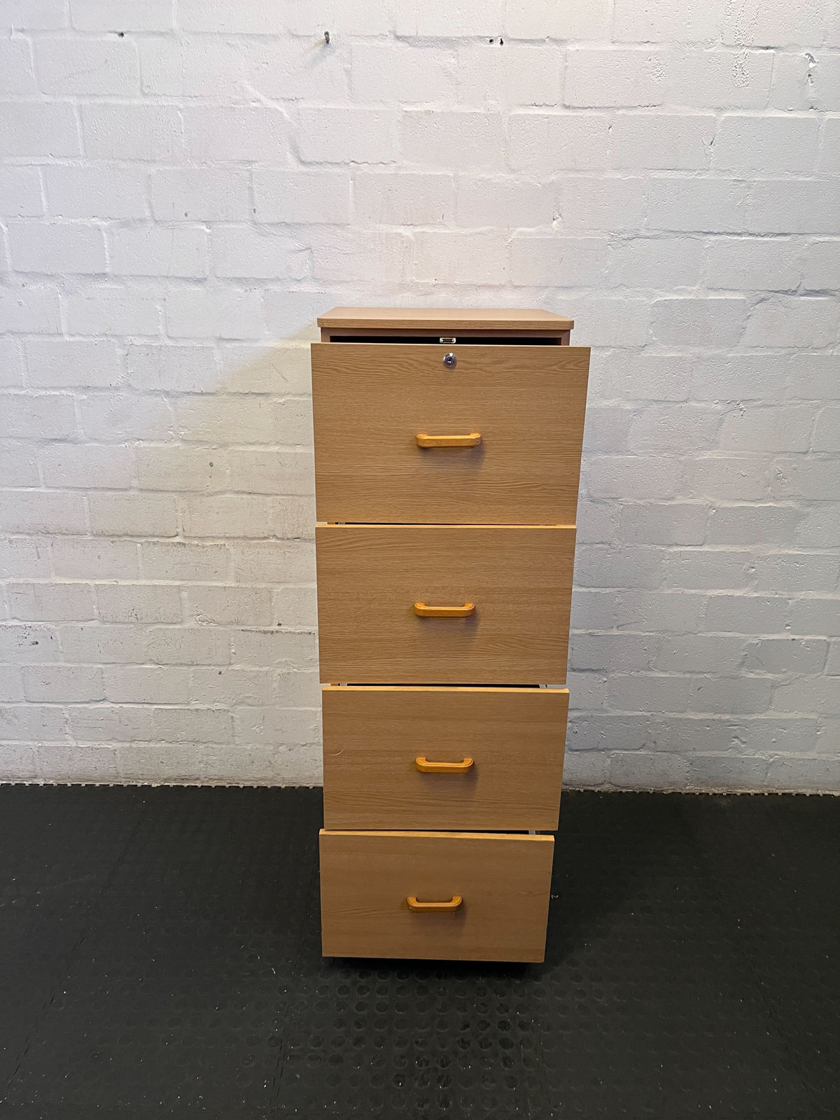 Stylish Light Wood 4-Drawer Storage Cabinet with Minor Wear