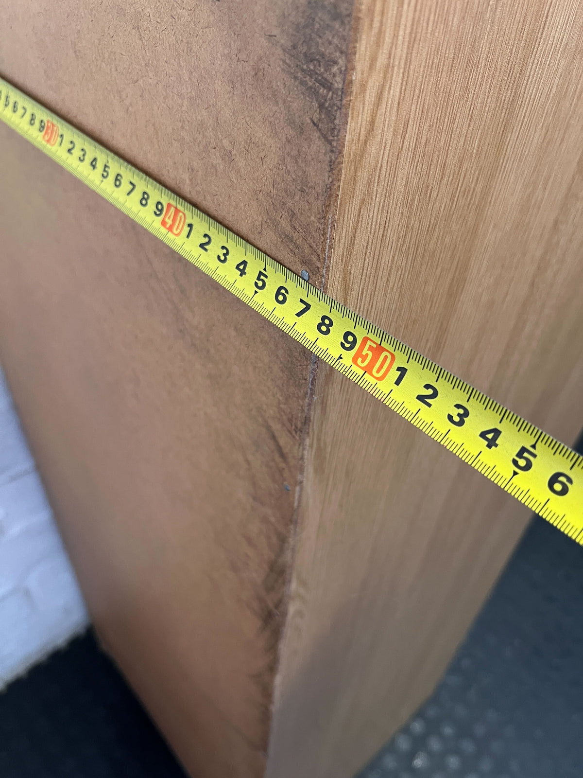 Stylish Light Wood 4-Drawer Storage Cabinet with Minor Wear