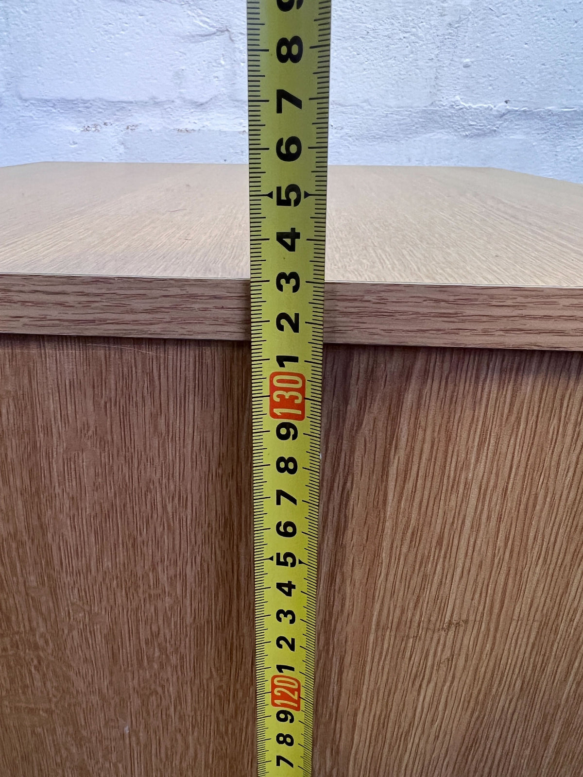 Stylish Light Wood 4-Drawer Storage Cabinet with Minor Wear