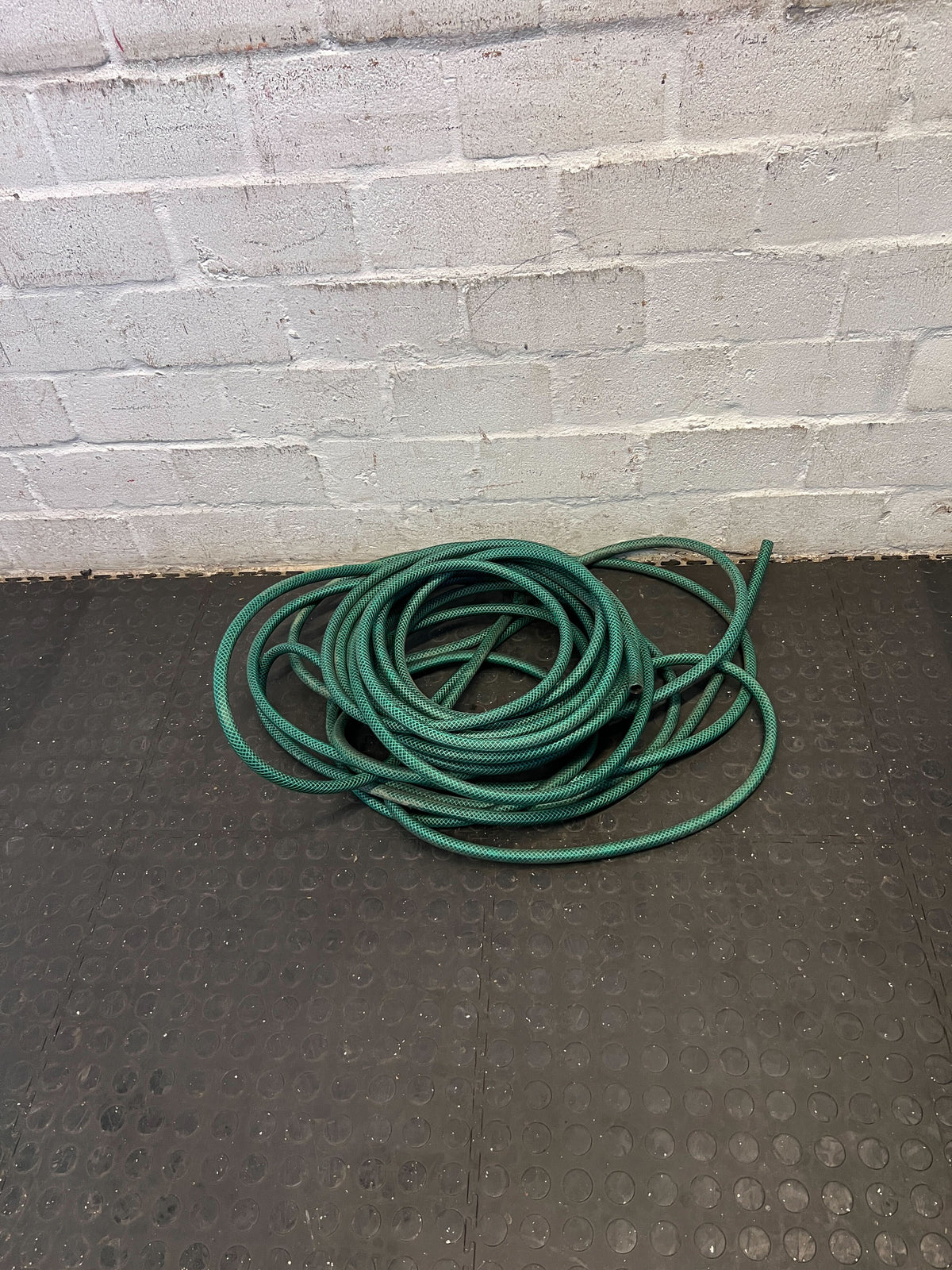 Green Garden Hose - Durable, Flexible, 25m Length, Good Condition - 2ndhandwarehouse.com