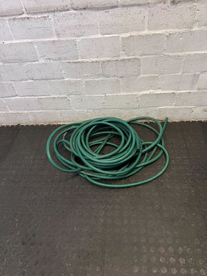 Green Garden Hose - Durable, Flexible, 25m Length, Good Condition - 2ndhandwarehouse.com